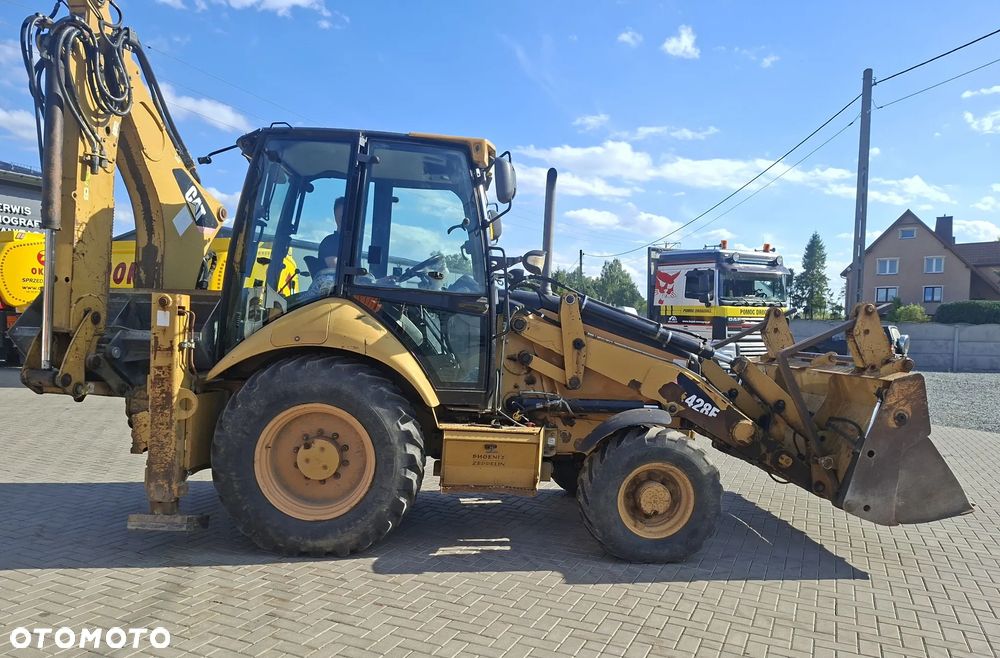 Caterpillar 428E - 4