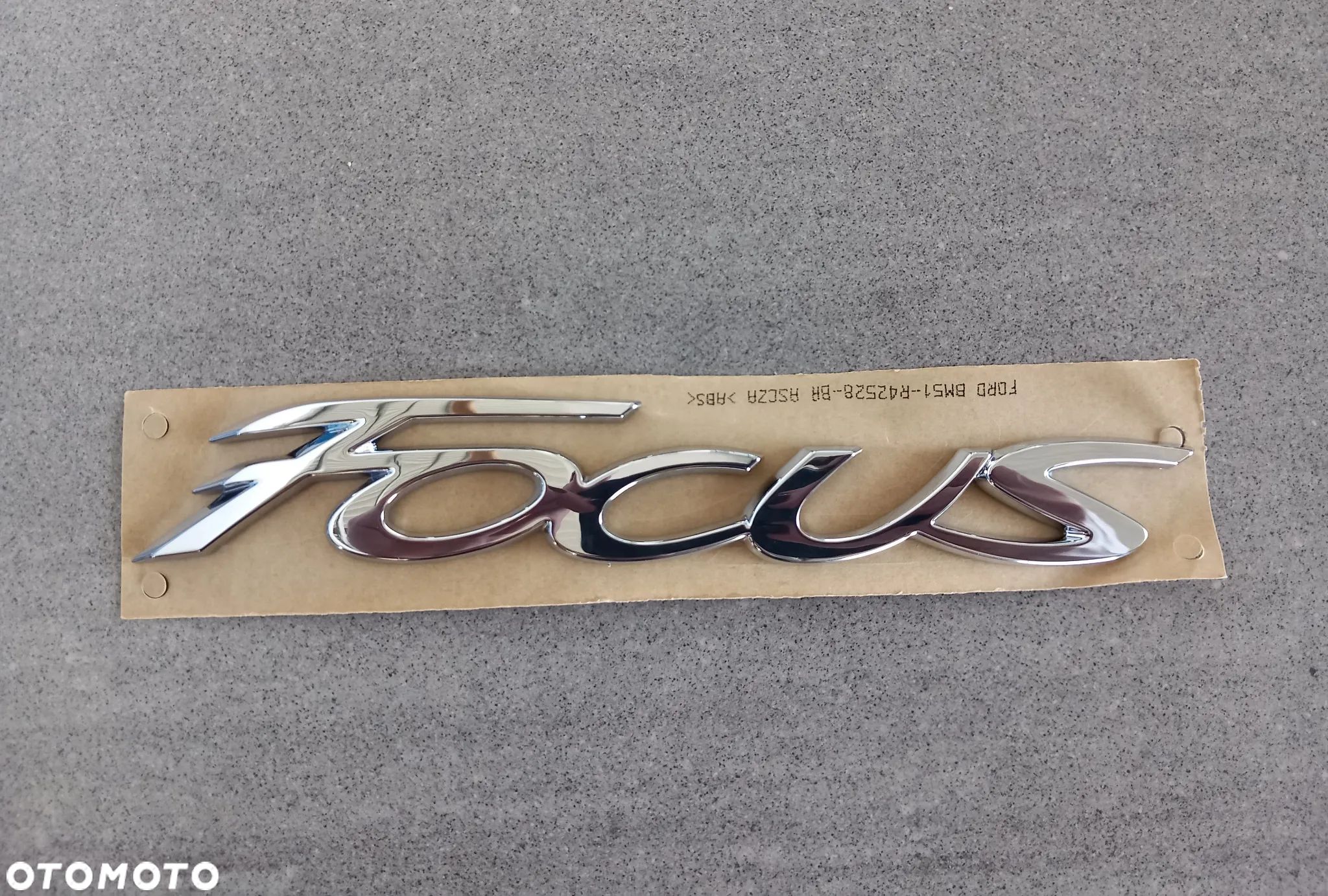 Emblemat znaczek Ford tył napis Focus 2011-2015, 2014-2019 1765113 - 1
