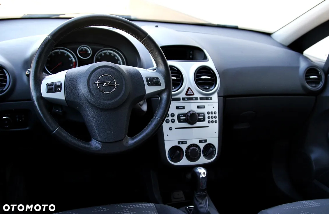 Opel Corsa 1.4 16V Enjoy - 23