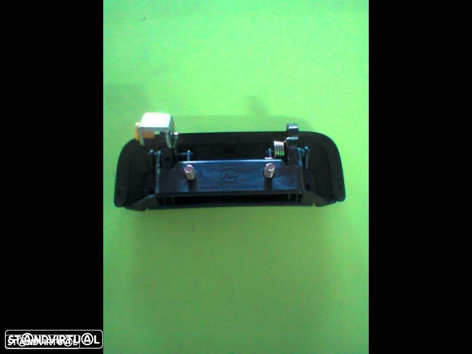 puxador tampa mala Mitsubishi L200 96-2005 (NOVO) - 2