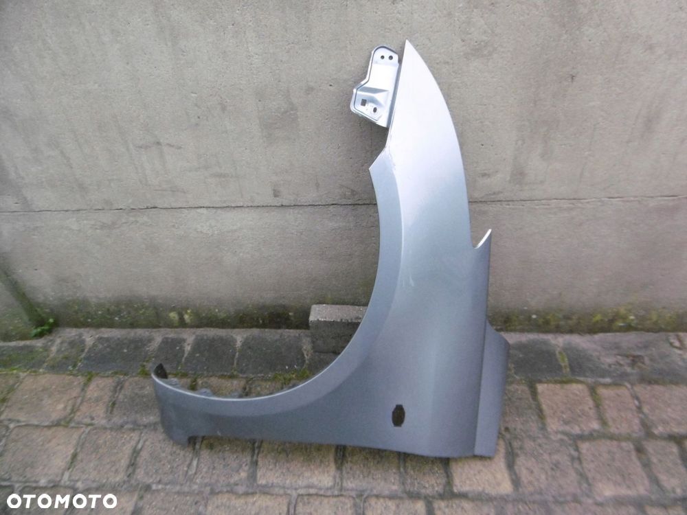 SUZUKI SWIFT MK7 - błotnik przedni lewy - 1