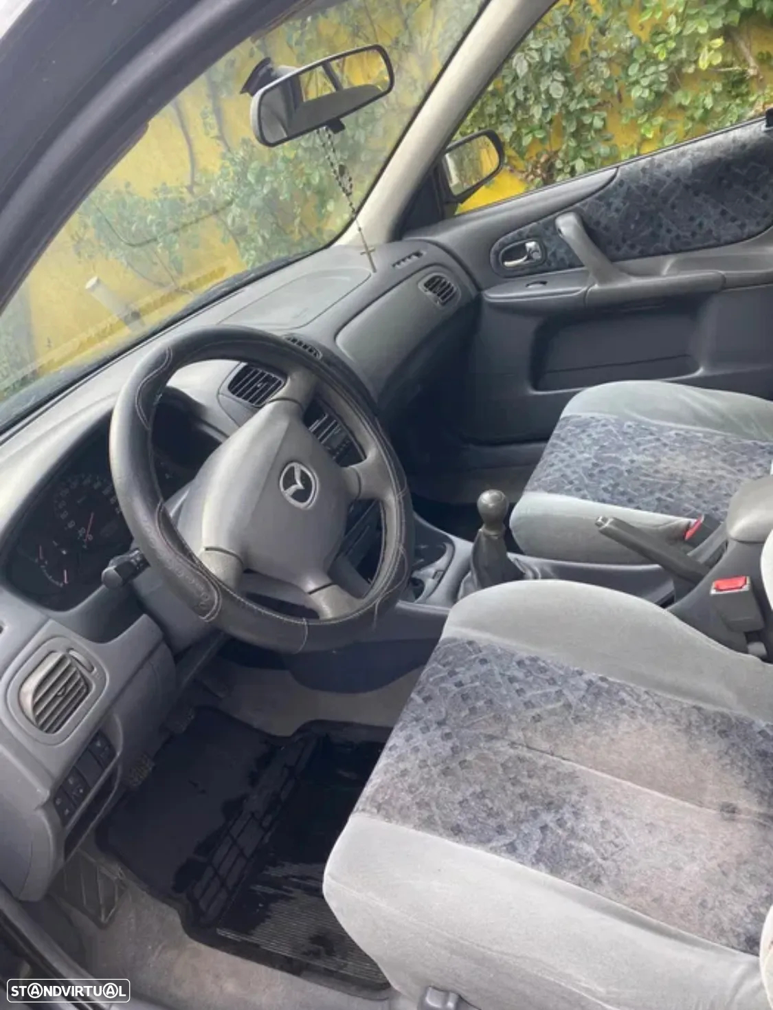 Mazda 323 - 4