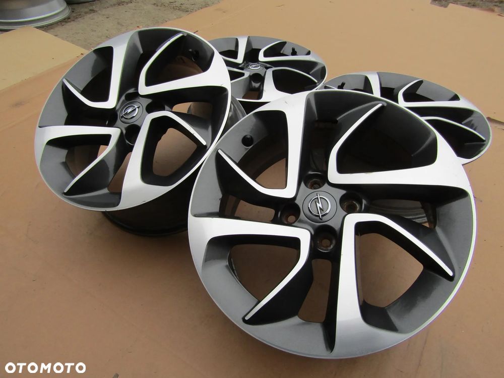 4x Felgi 16 Opel Adam Astra G H Corsa D E Meriva Combo C Karl Fiat Grande Punto Evo 4x100 - 12