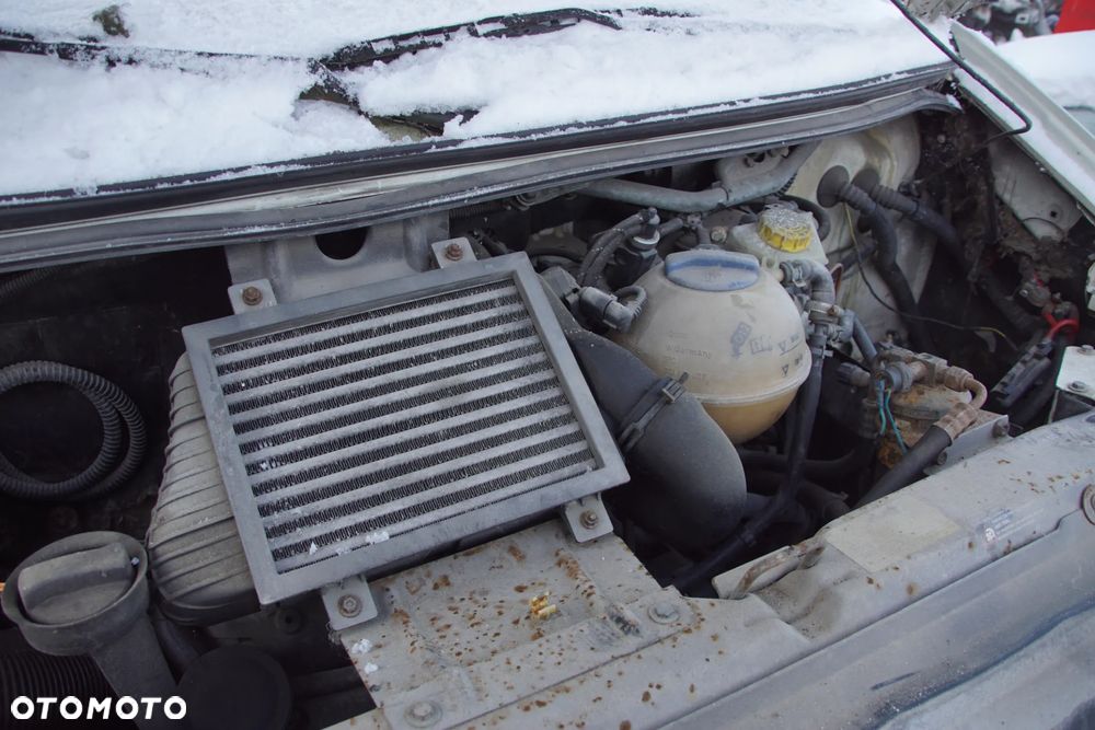 Auto na części - Volkswagen Transporter T4 Lift 2.5 TDI 102 KM ACV DXZ L902 2002R Silnik Skrzynia Drzwi Maska Klapa Błotnik Zderzak Lusterko Lampa Deska Kokpit Sterownik Moduł Czujnik Licznik Panel Kierownica - 15