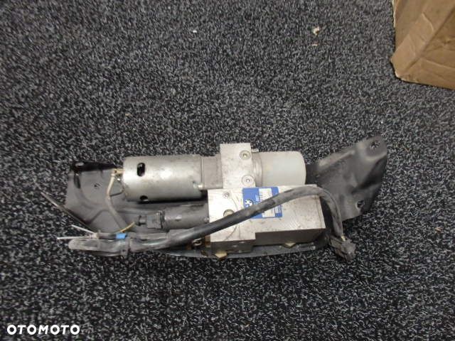 BMW 5 e61 POMPA ELEKTRYCZNEJ KLAPY 7111867    RAF-AUTO CZĘŚCI BMW - 1