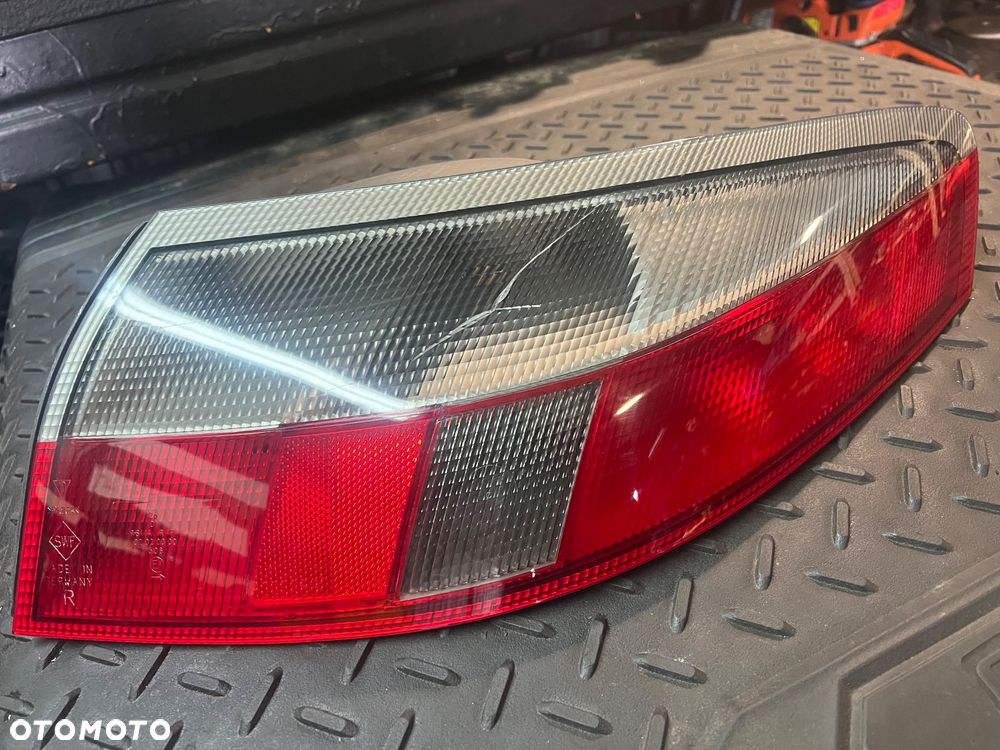PORSCHE CARRERA 996 LAMPA PRAWY TYŁ PRAWA TYLNA NOWA Z PĘKNIĘCIEM SZARA CIEMNA EUROPA ORYGINAŁ - 1