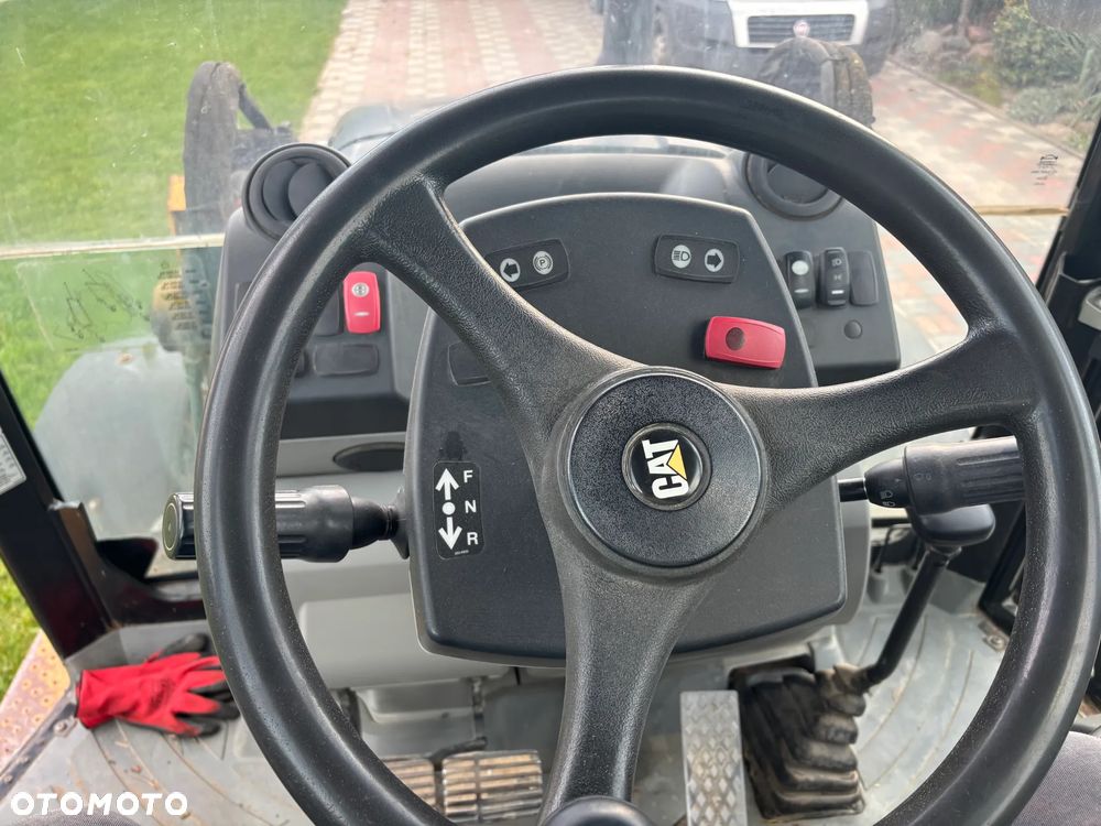 Caterpillar 428E - 8