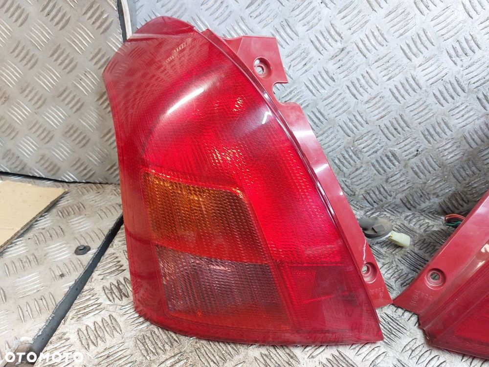 LAMPA LEWY TYŁ + PRAWY TYŁ SUZUKI SWIFT IV HB 5D 04-10  TYC - 2