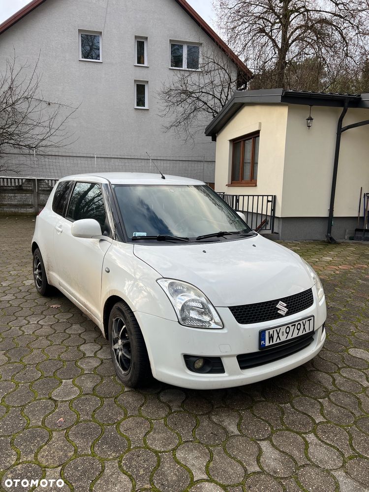 Suzuki Swift 1.3 Club - 8