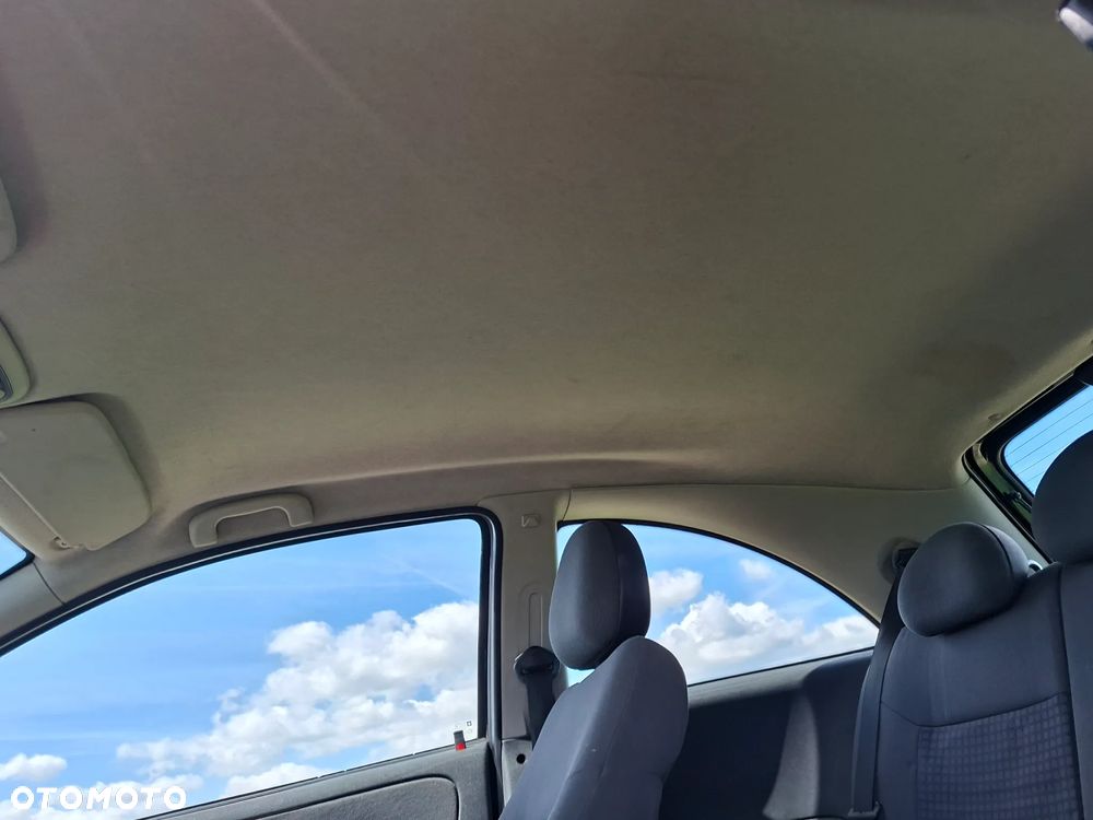 Opel Corsa 1.2 16V NJoy - 9