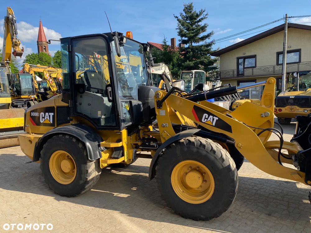 Caterpillar CAT 908H2, 2014 ROK, 6000 MTH, ŁYŻKA OTWIERANA + WIDŁY, z NIEMIEC, - 12