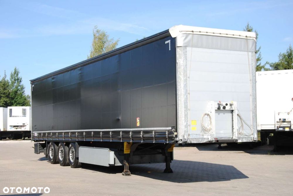 Schmitz Cargobull SCS kurtyna, podnoszona oś - 2
