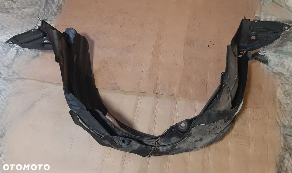 Nadkole TOYOTA YARIS II  lewe przód OE - 2