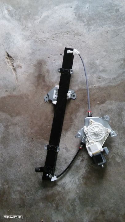 Elevador completo novo nissan micra k12 porta tras lado condutor - 1