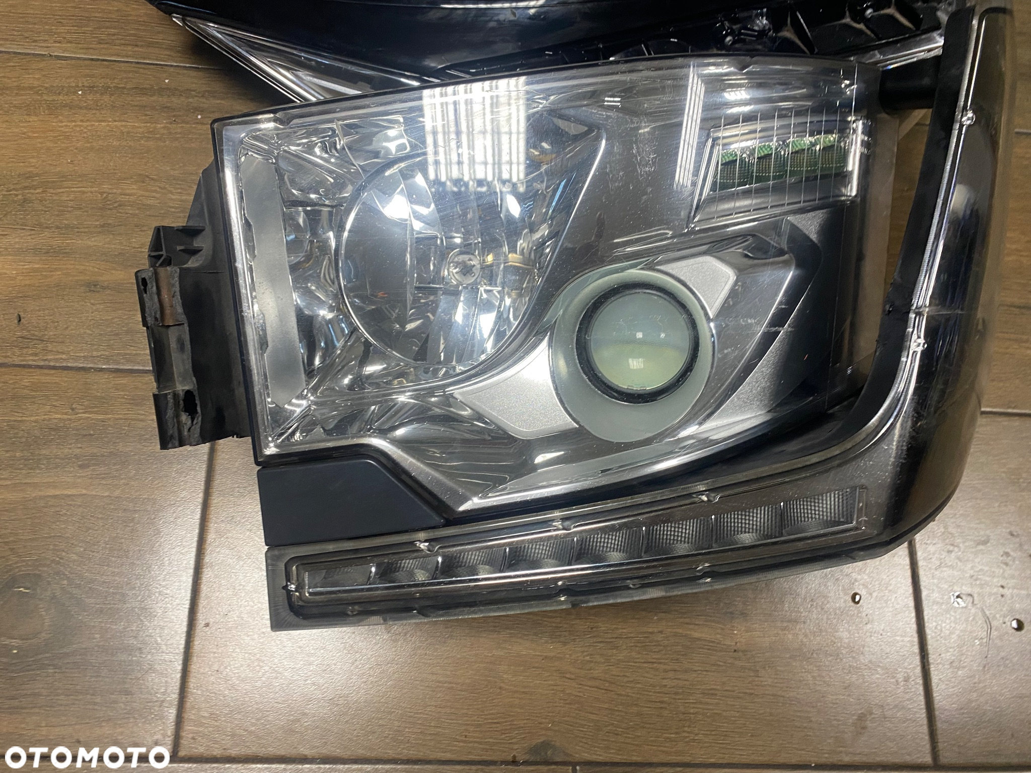 RENAULT GAMA T RANGE LAMPA LEWA PRZÓD 89207611 KMP ORG - 2