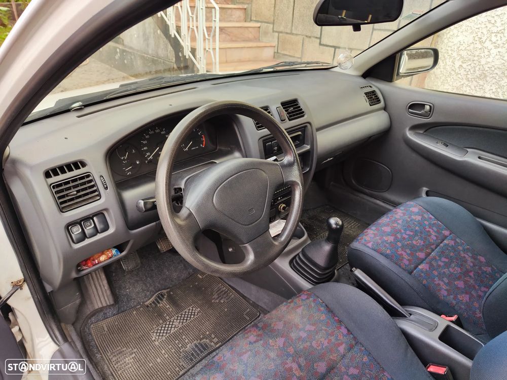 Mazda 323 P 1.3 TA - 13