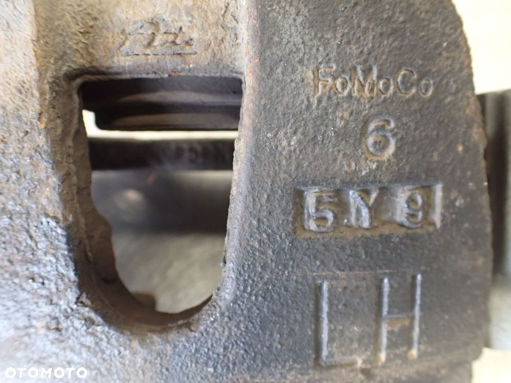 ZACISK HAMULCA LEWY PRZÓD MAZDA 5 2.0 - 3