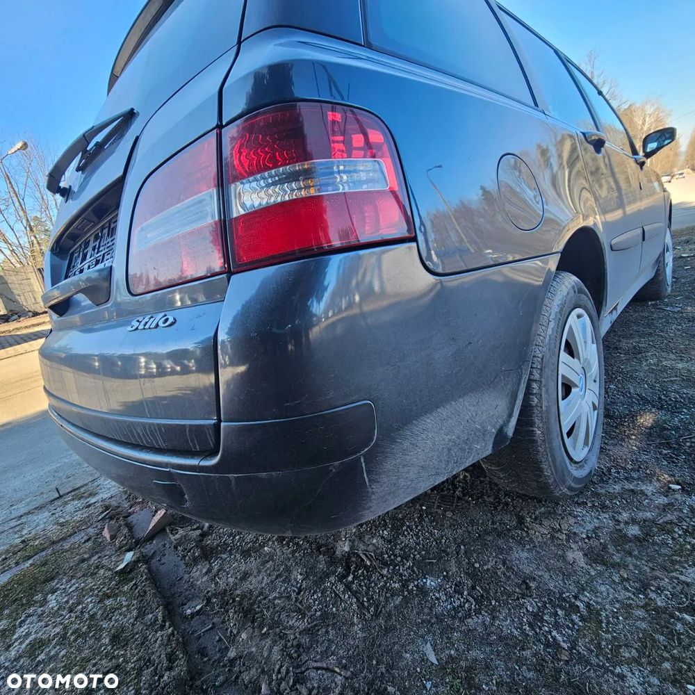 Fiat Stilo 1,6 B 76 kW / 103 KM (2003 kombi) (kod lak: 675) pojazd na części: maska, zderzak, drzwi, szyby, lusterka, chłodnica ... - 24