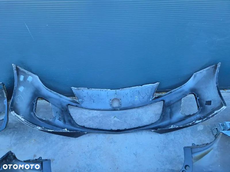ORYGINALNY ZDERZAK PRZEDNI TYLNI  MAZDA  MAZDA 3 - 23