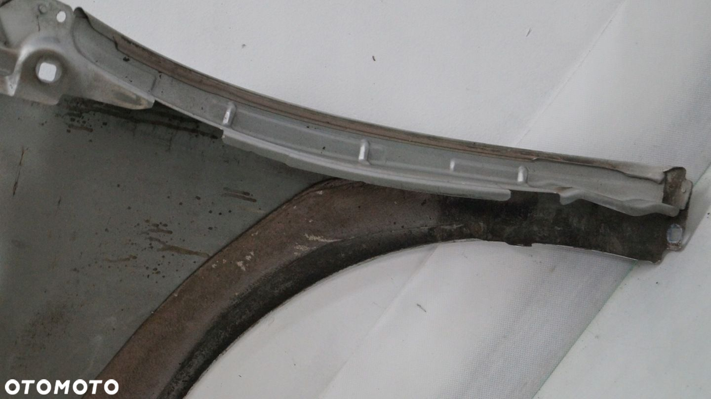 BŁOTNIK PRZEDNI PRAWY RENAULT LAGUNA III TED69 2010 - 12