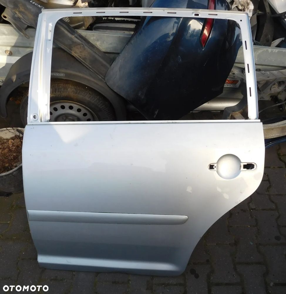 drzwi lewe tył VW TOURAN I SREBRNE LA7W - 1