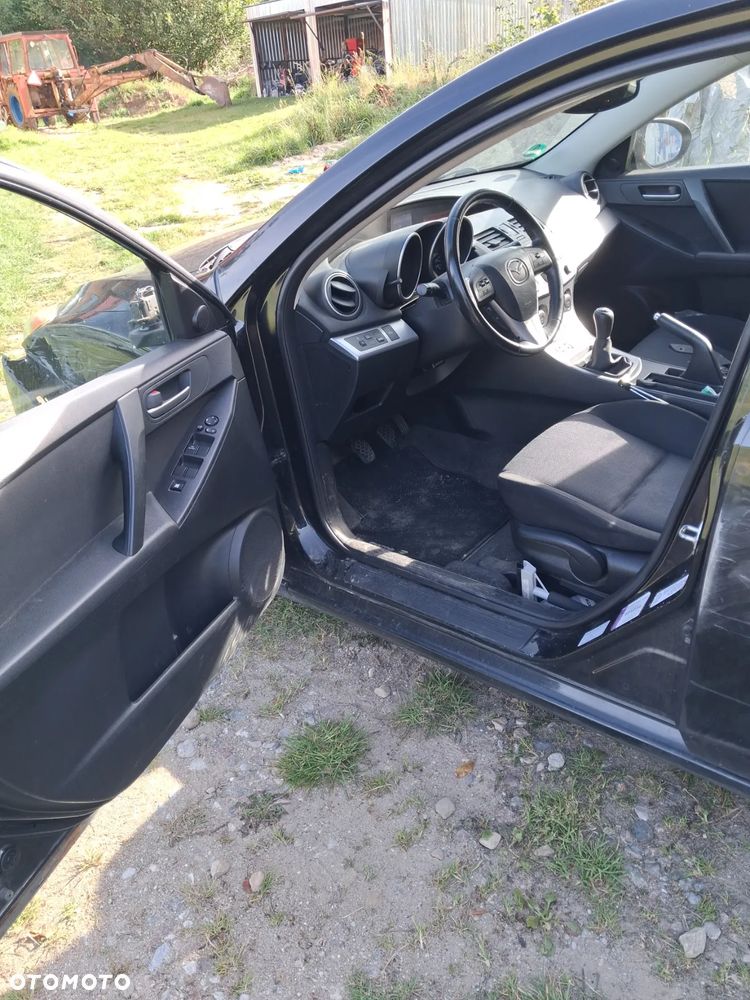 Mazda 3 1.6 CD Exclusive + - 7