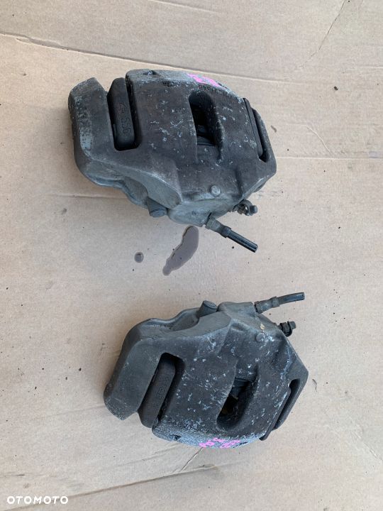 ZACISKI JARZMA PRZEDNIE KOMPLET BMW E65 730d - 1