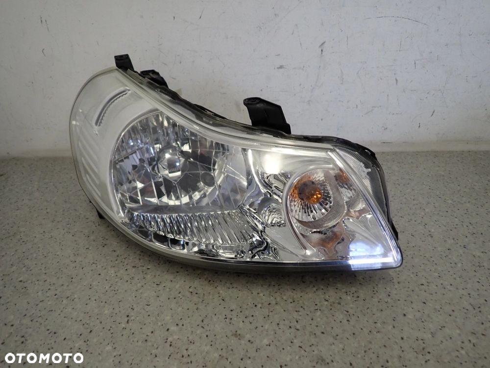 SUZUKI SX4 FIAT SEDICI 06-13 LAMPA PRZEDNIA PRAWA REFLEKTOR - 1