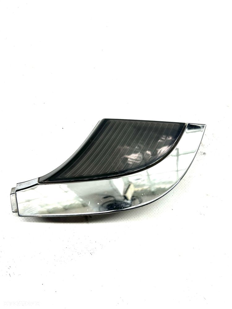 Saab 95 95 lewy odblask reflektora kierunkowskaz chrom 2006-2009 lampy dekor 89101420 - 2