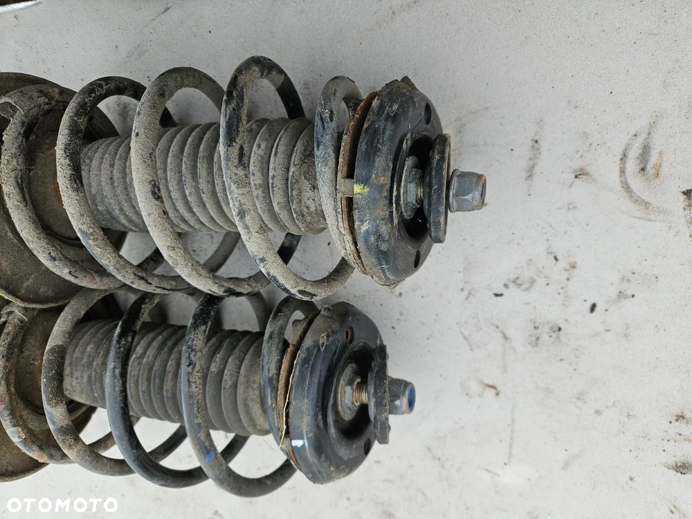 Amortyzator sprezyna McPherson lewy prawy przedni Peugeot 308 T7 1,6 VTI THP 2804 1694 - 2