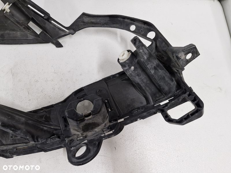 BMW X5 E70 LIFT ŚLIZG UCHWYT WZMOCNIENIE BŁOTNIKA LEWY PRZÓD 7222973 - 7