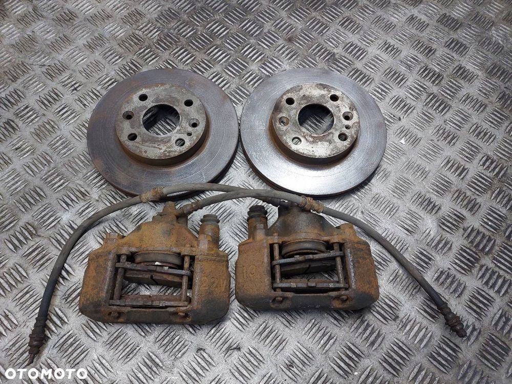 TARCZE HAMULCOWE PRZÓD + KLOCKI + ZACISKI MAZDA DEMIO I 1.5 16V - 1