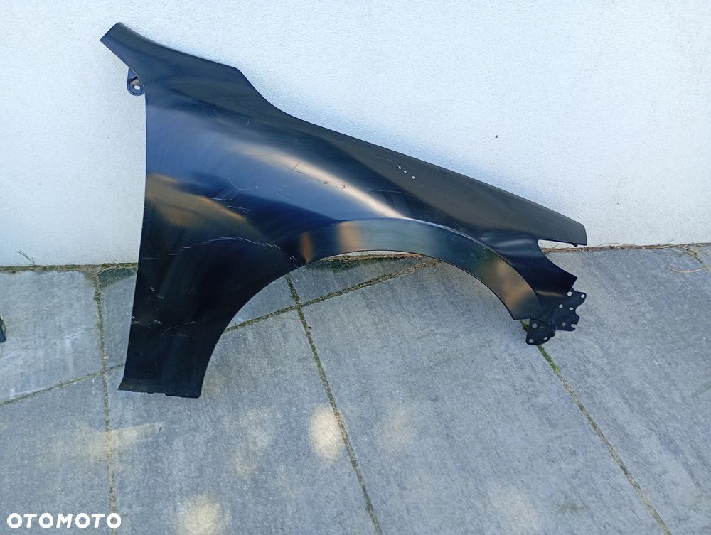 MAZDA 3 IV BP 19-> błotnik PRAWY przód NOWY