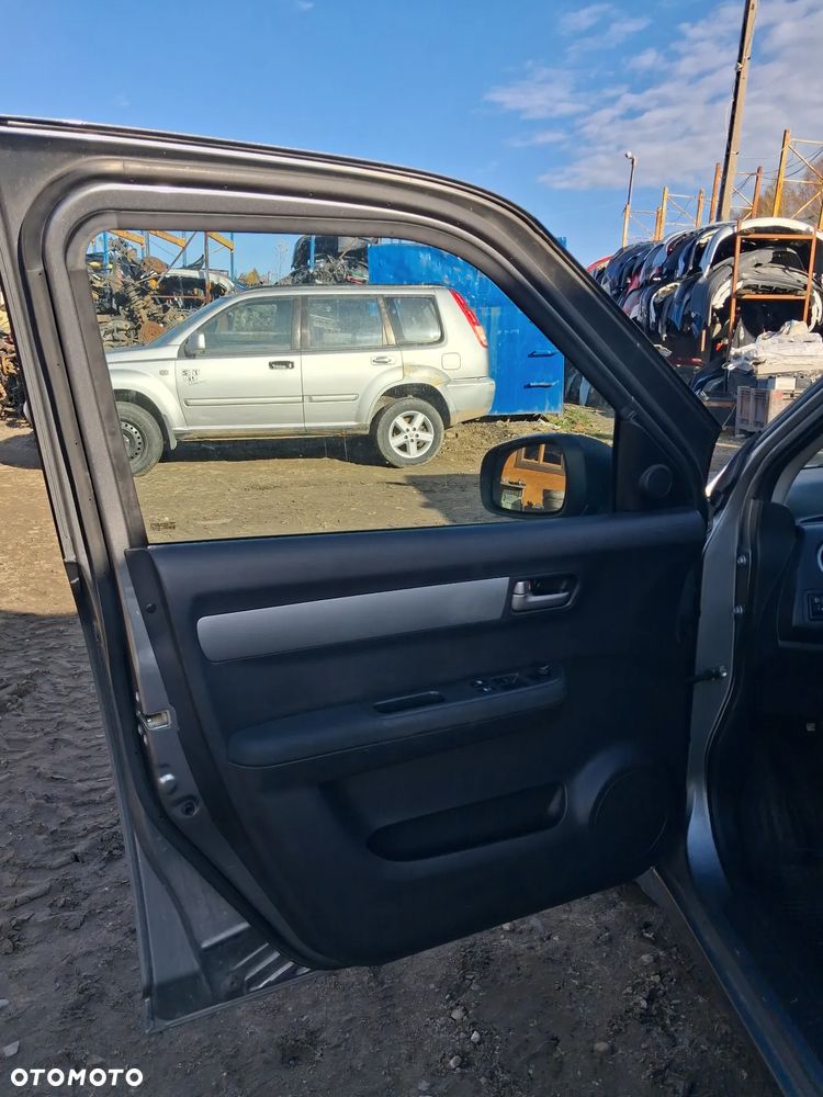 Suzuki Swift 05 drzwi lewy przod ZCD - 4