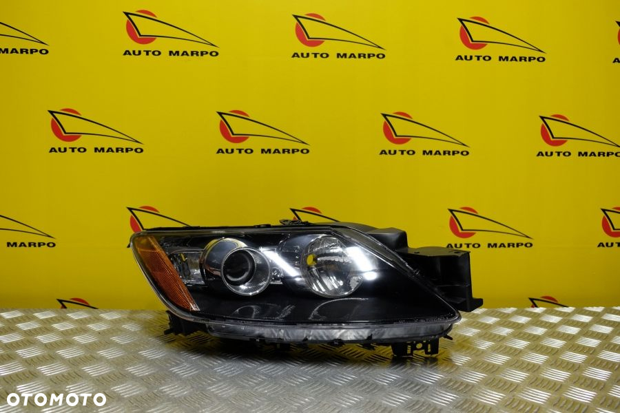 MAZDA CX-7 CX7 2006- REFLEKTOR LAMPA ZWYKŁA SOCZEWKOWA PRAWA USA - 2