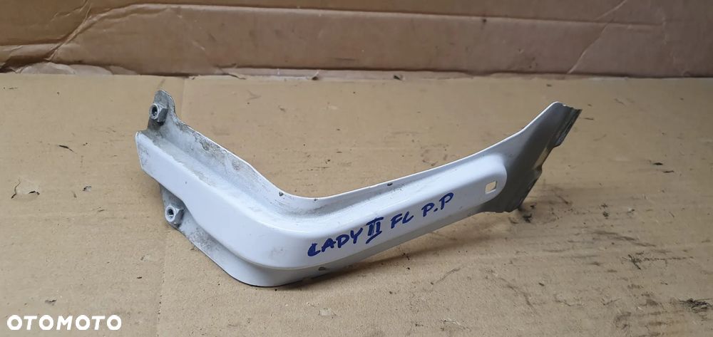 Mocowanie błotnika uchwyt wspornik prawy przód VW Caddy III Lift 1T0821135C LB9A - 1
