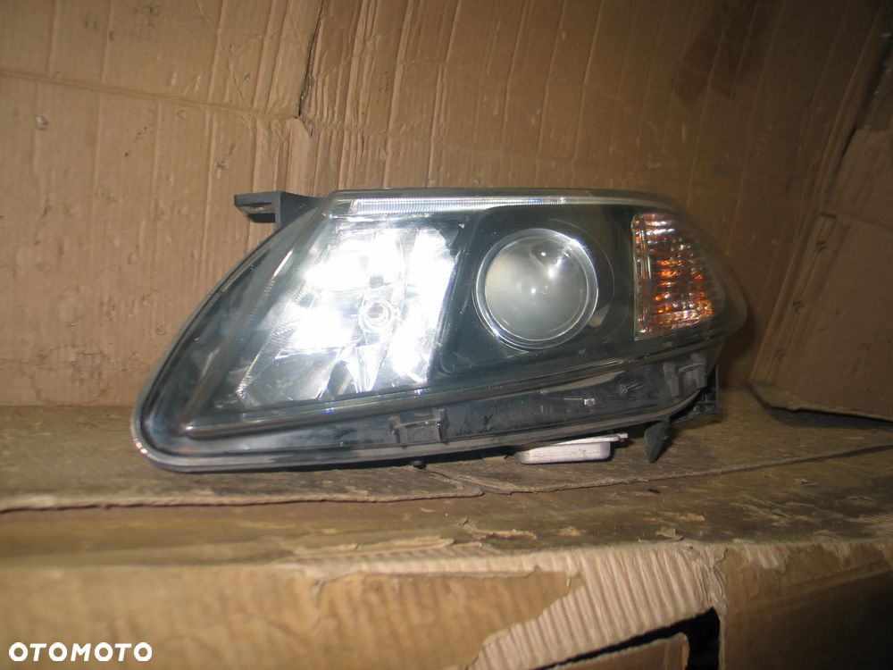 lampa xenon przod saab 93 9-3 2 II lift 07-14r. oryginal europa - 6