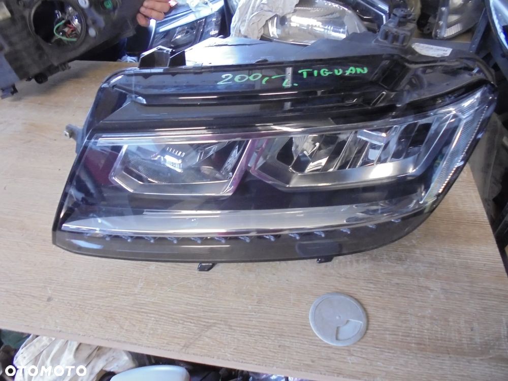 VOLKSWAGEN TIGUAN LAMPA LEWA PRZÓD EUROPA - 1