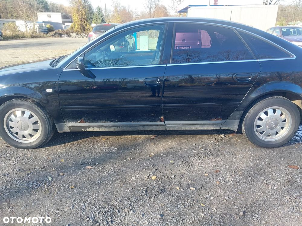 Audi A6 C5 sedan silnik kompletny 1.8 Turbo AEB turbina turbosprężarka cewka wiązka przepustnica przepływomierz kolektor skrzynia biegów DHW sprzęgło dwumasa drzwi lewe prawe klapa błotnik lusterko kolor LY9B czarny maglownica wydech tłumik lampa tył tylna blenda belka rura dolotowa przewód podłokietnik sterownik panel boczki fotele grzane alufelgi szyba dekory NA CZĘŚCI WSZYSTKIE CZĘŚCI - 8