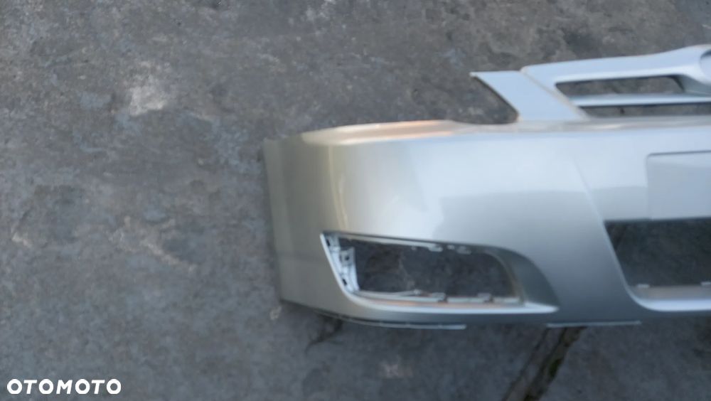 Toyota Corolla E12 04-07 LIFT zderzak przedni hatchback  kod lakieru 1C0 - 2