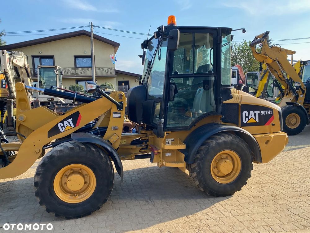 Caterpillar CAT 907H2, 5800 MTH, ŁYŻKA OTWIERANA + WIDŁY, z NIEMIEC, - 15