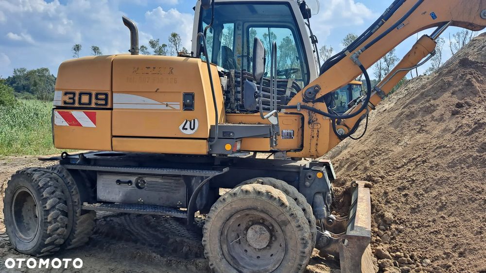 Liebherr 309 - 3
