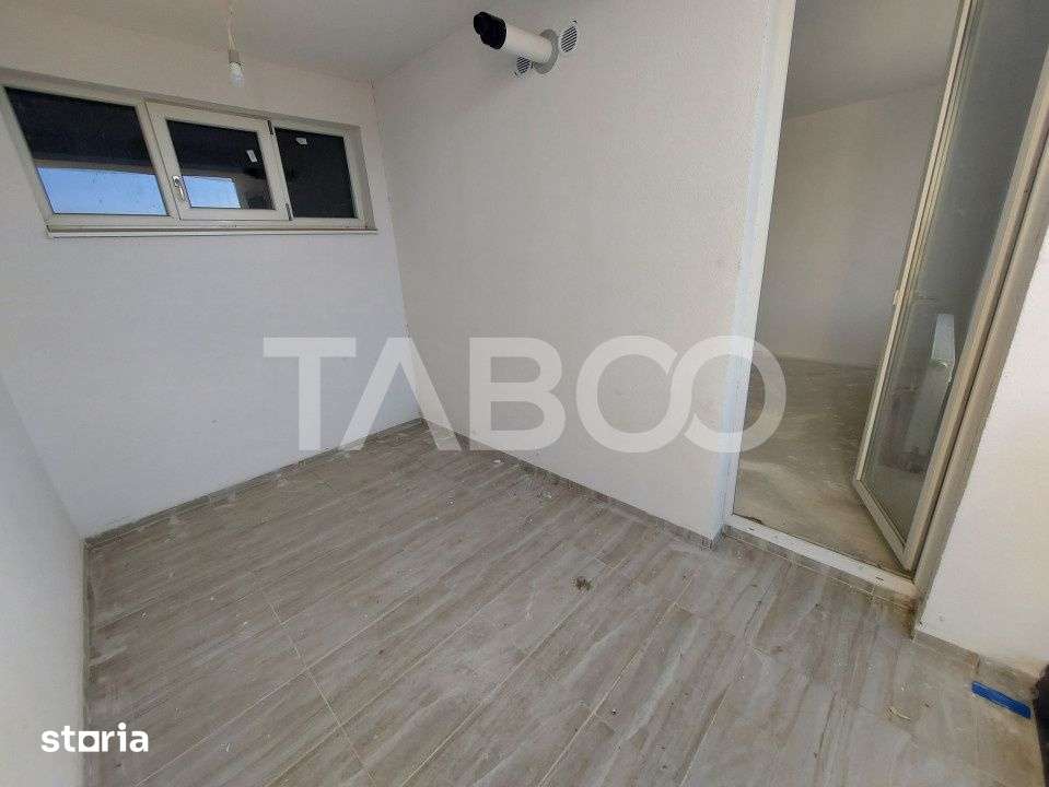 Apartament decomandat de vanzare 52 mpu 2 camere 2 logii loc parcare — fotografia 3