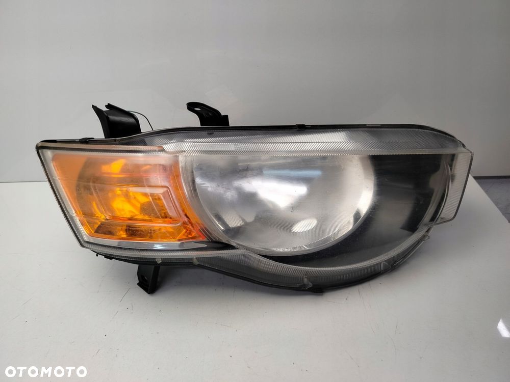 mitsubishi colt lift 09r- reflektor lampa prawy przód prawa przednia - 1