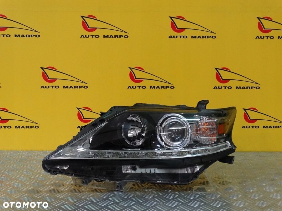 LEXUS RX RX350 2012- REFLEKTOR LAMPA LEWA ZWYKŁA SOCZEWKOWA Z LED USA - 2