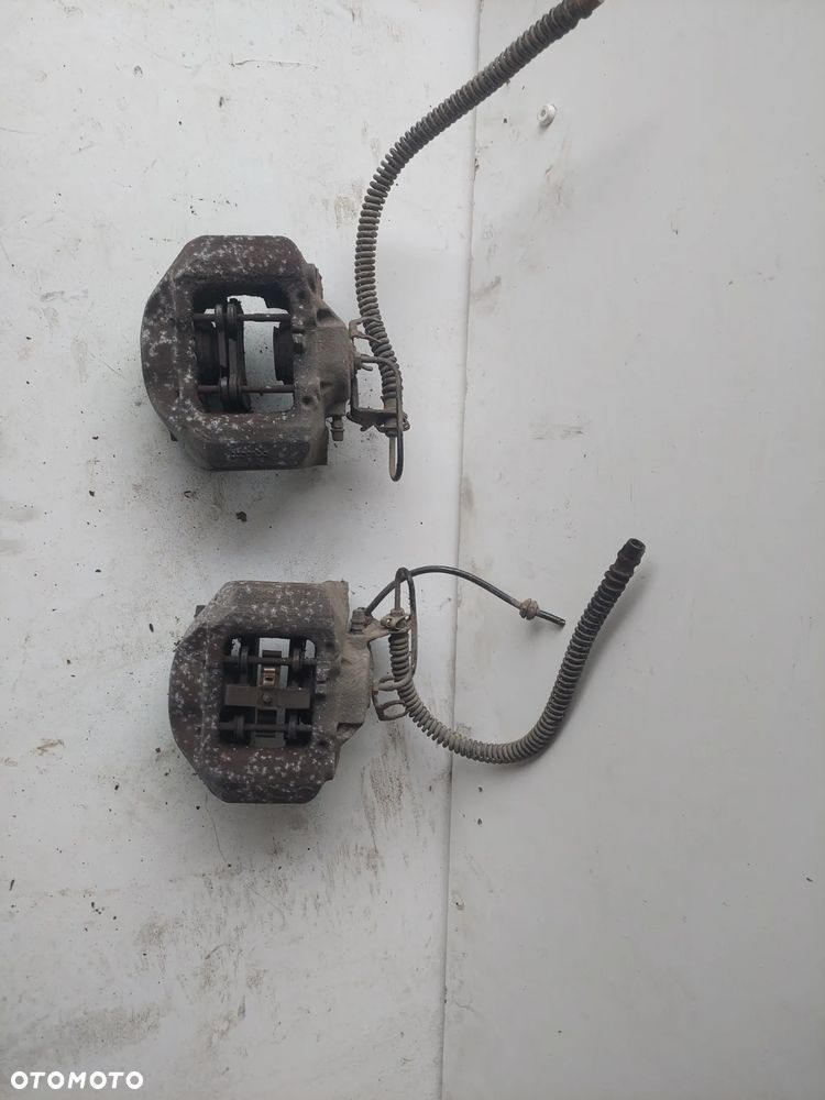 ZACISK HAMULCOWY LEWY PRAWY TYŁ VOLKSWAGEN TOUAREG 7L 3.0TDI - 1