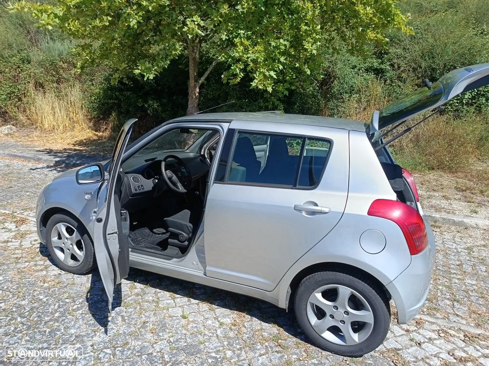 Suzuki Swift 1.3 DDiS GLX - 13