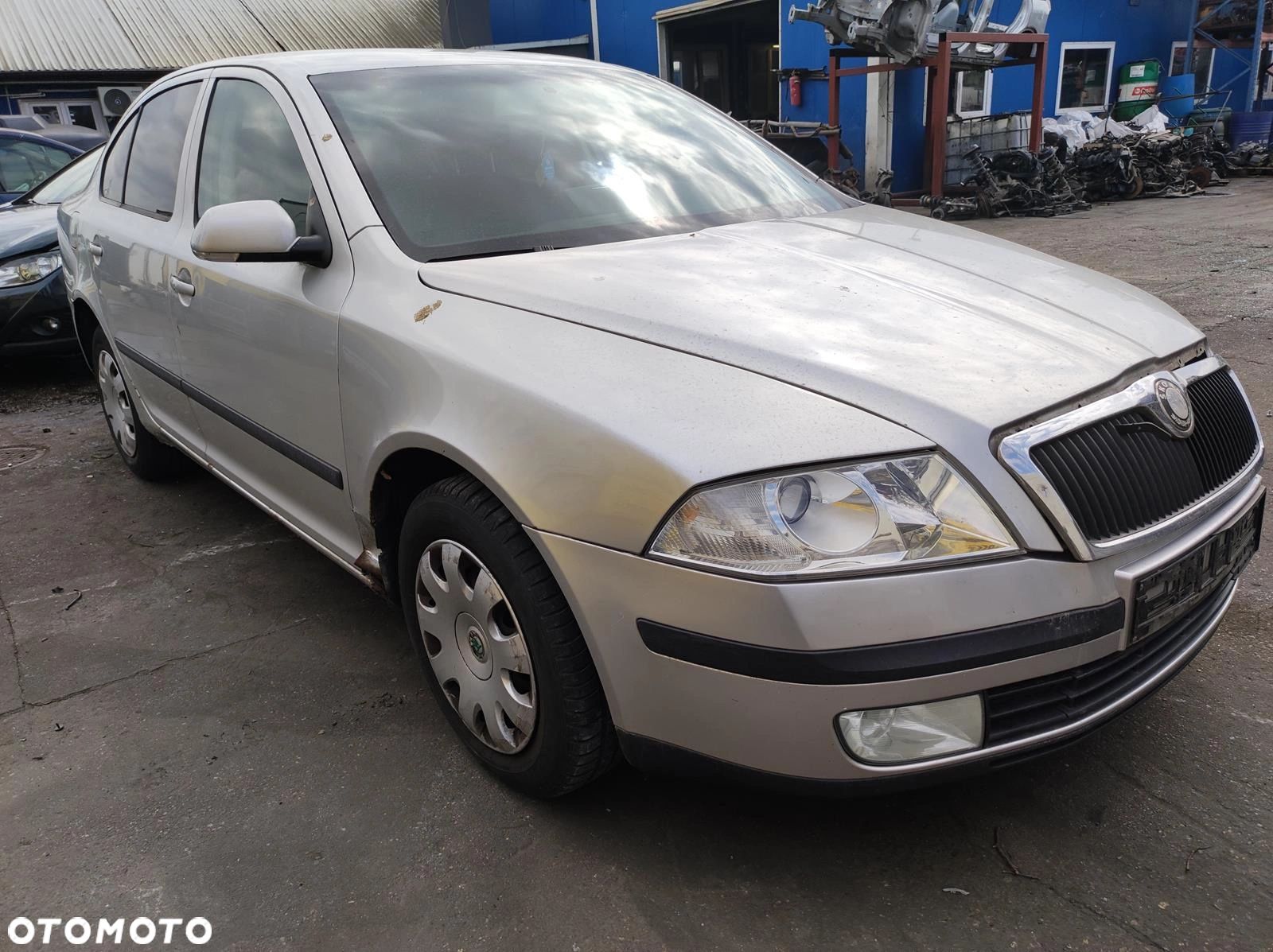 ZDERZAK MASKA BLOTNIK LAMPA SKODA OCTAVIA II - 1