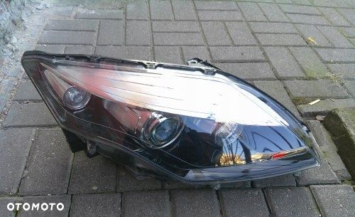 RENAULT LAGUNA III LIFT 10 XENON PRAWA PRZEDNIA LAMPA ORYGINAŁ 260105295R - 2