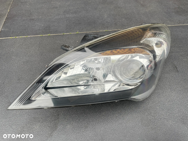 LAMPA LEWA LEWY REFLEKTOR KIA CEED I 1 LIFT 09-12